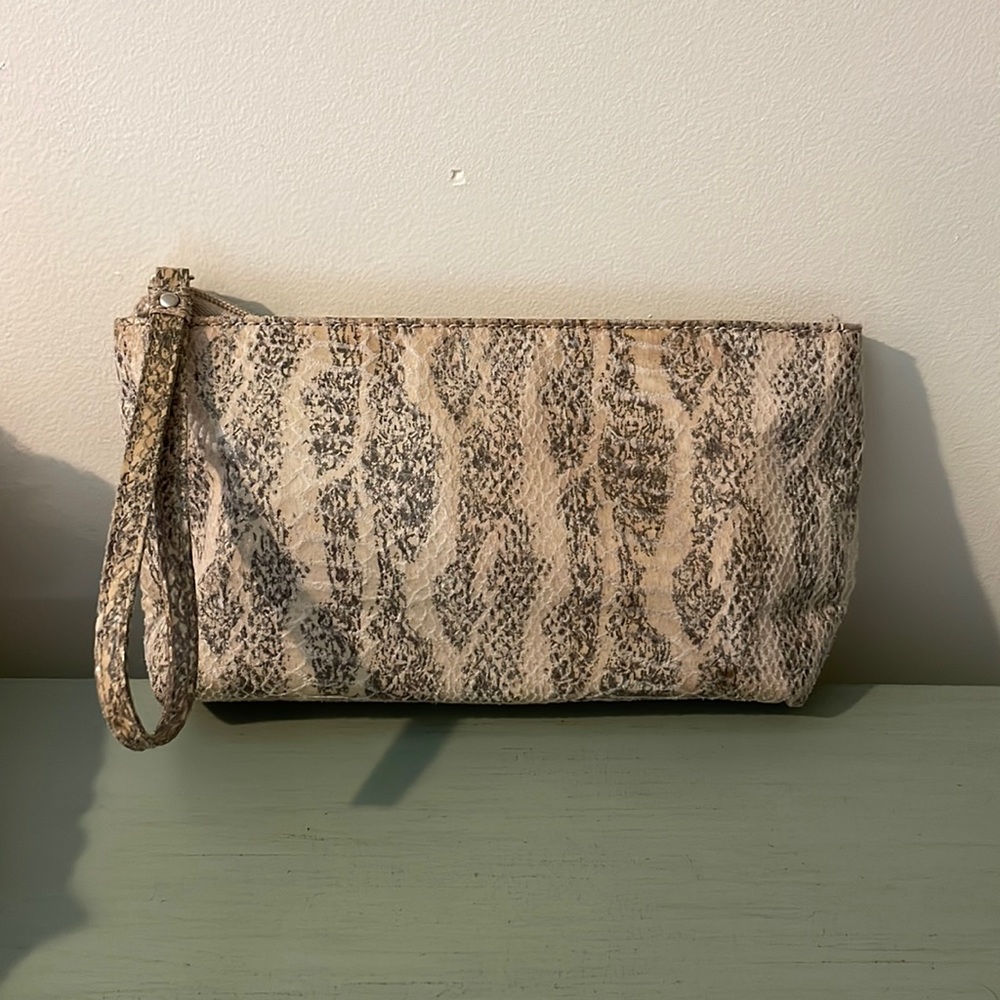 Gray snake skin clutch.